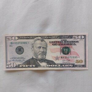 $50 dollar bill with star note